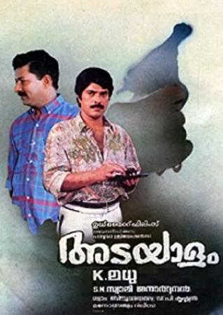 Adayalam <span style=color:#777>(1991)</span> - Malayalam Superhit Detective Movie - WEBRip - AVC - AAC - BigYo AnJaaN